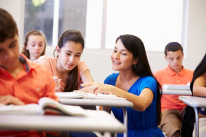 High School teacher and students In classroom
